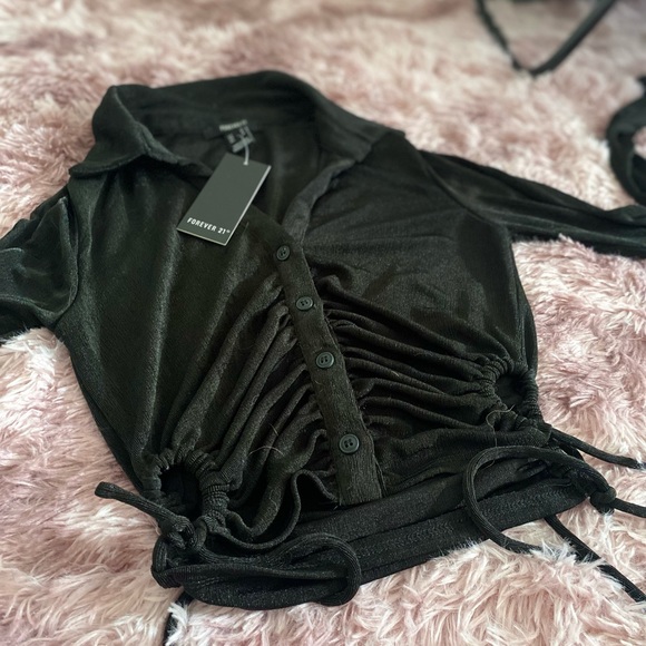 Black button up top - Picture 1 of 4